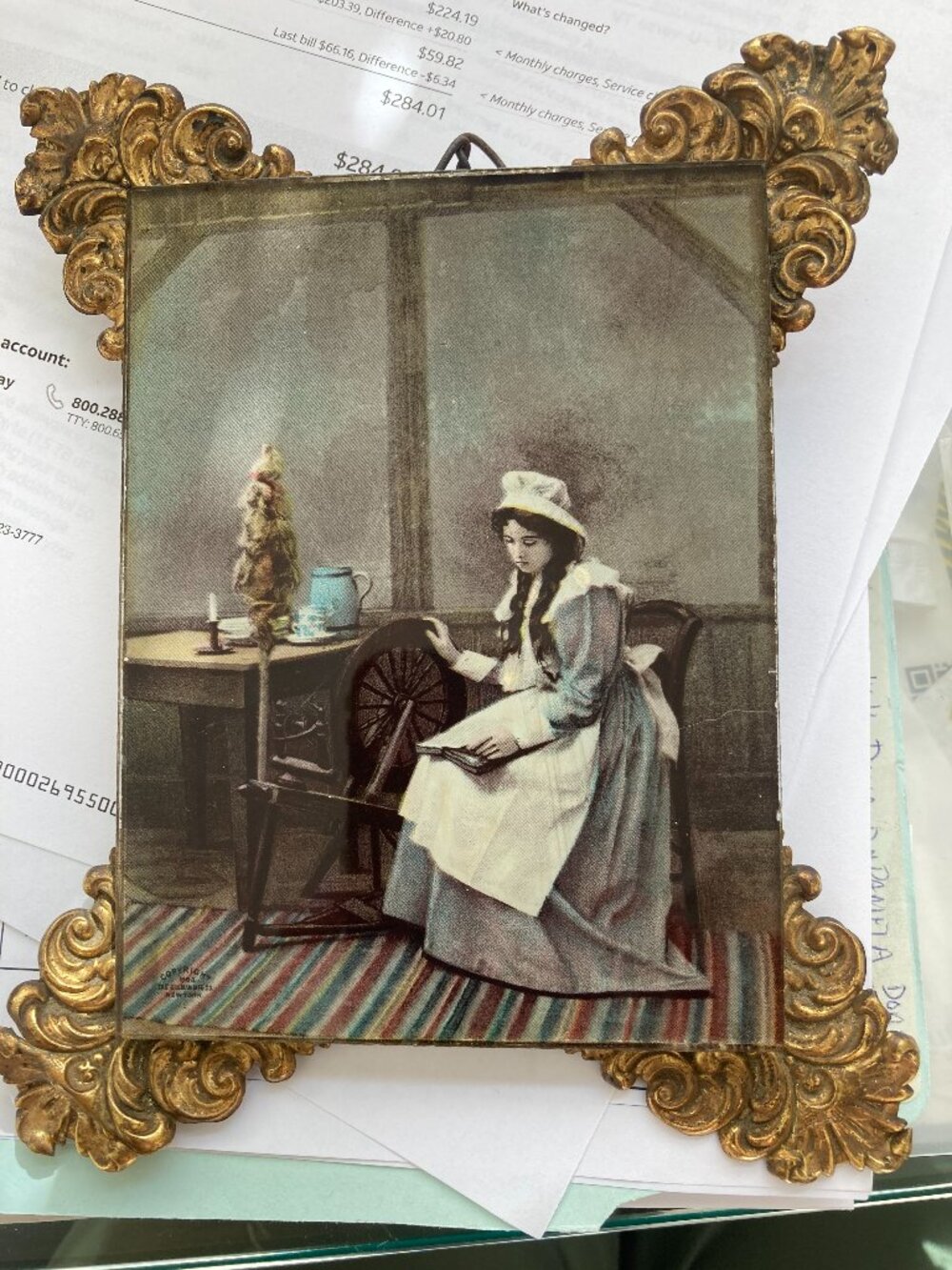 Antique print and gilded frame - woman with book and spinning wheel